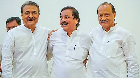 Maharashtra Deputy Chief Minister and NCP President Ajit Pawar with party leaders Sunil Tatkare and Praful Patel amid the counting of votes for the Maharashtra Assembly elections, in Mumbai.