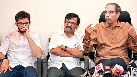 Shiv Sena (UBT) chief Uddhav Thackeray with party leaders Sanjay Raut and Aaditya Thackeray