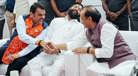 Maharashtra Chief Minister Devendra Fadnavis (left) and his deputies Eknath Shinde (centre) and Ajit Pawar