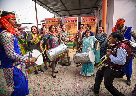 BJP supporters celebrate their victory in Bihar assembly by-polls, in Patna.