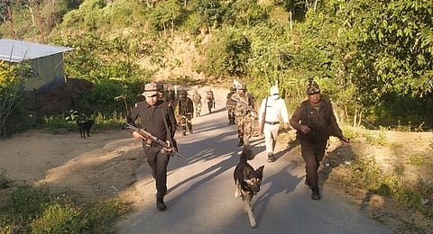 Security personnel during a search operation in the vulnerable areas of hill and valley districts of Manipur.