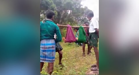 Due to lack of road facility, the Kurumalai villagers carried a pregnant woman for about 5.5 km by cradle in Tiruppur district.