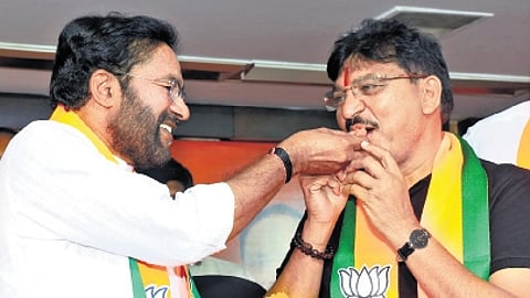 Union Minister G Kishan Reddy celebrates the BJP’s victory in the Maharashtra Assembly elections by distributing sweets among the party cadre in Hyderabad on Saturday