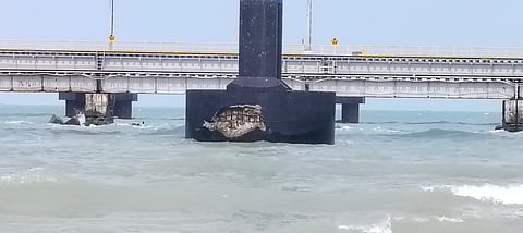 A portion from the concrete pillar of the Pamban road bridge had fallen off exposing the steel reinforcement bars.