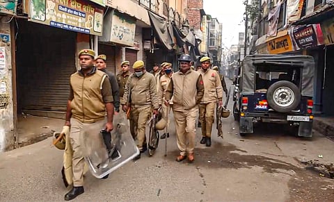 Security personnel deployed to maintain law and order, a day after clashes between police and protesters opposing the survey of the Jama Masjid, in Sambhal, Uttar Pradesh