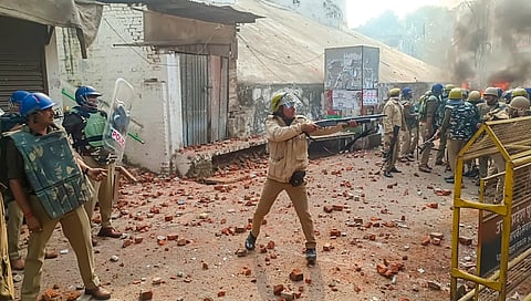 Police try to control the situation amid violence during a second survey of the Jama Masjid, claimed to be originally the site of an ancient Hindu temple, in Sambhal.