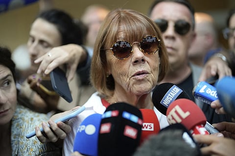 Gisèle Pelicot speaks to media as she leaves the Avignon court house, southern France, Thursday, Sept 5, 2024.