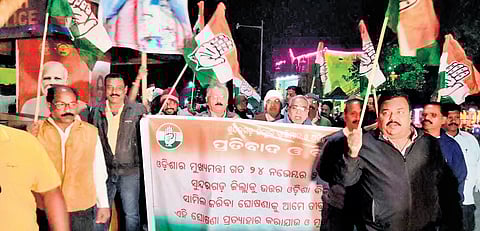 Congress workers staging protest at DRDA chowk in Sundargarh town