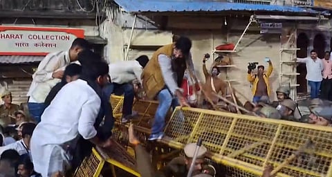 Supporters of BJP MLA Vishvaraj Singh break police barricade after he was denied entry into Udaipur Palace, hours after he was anointed the titular head of the erstwhile royal family of Mewar, in Udaipur.