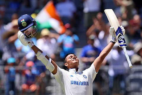 India's Yashasvi Jaiswal celebrates his century on the third day of the first cricket test between Australia and India in Perth.