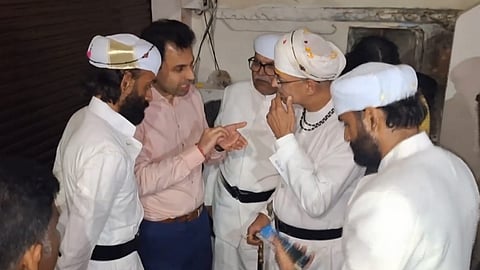 BJP MLA Vishvaraj Singh speaks with officals after he was denied entry into Udaipur Palace, hours after he was anointed the titular head of the erstwhile royal family of Mewar, in Udaipur.