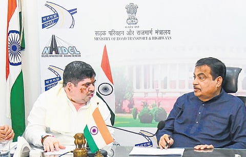 Transport Minister Ponnam Prabhakar makes a point to Union Road Transport and Highways Ninister Nitin Gadkari in New Delhi on Wednesday