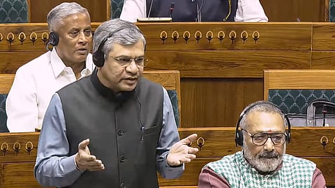Union Minister Ashwini Vaishnaw speaks in the Lok Sabha during the Winter session of Parliament in New Delhi, Wednesday, Nov. 27, 2024.