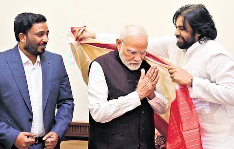 Deputy Chief Minister Pawan Kalyan felicitates Prime Minister Narendra Modi in New Delhi on Wednesday