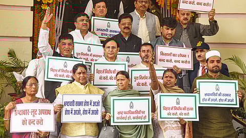 Senior RJD leader Rabri Devi with party legislators stages a protest during the Winter session of the Bihar Legislative Assembly, in Patna, Wednesday.