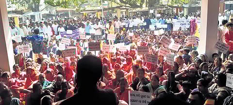 Farmers staging a protest meet in Bargarh on Tuesday