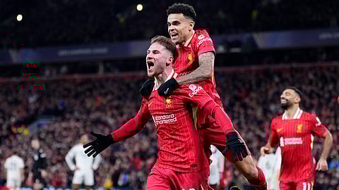 Liverpool's Alexis Mac Allister, left, celebrates with Luis Diaz after scoring the opening goal during the Champions League opening phase soccer match between Liverpool and Real Madrid at Anfield Stadium, Liverpool.