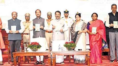 Governor Raghubar Das releasing the book in presence of his Goa counterpart PS Sreedharan Pillai and other dignitaries