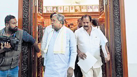 Chief Minister Siddaramaiah arrives at Vidhana Soudha to attend the cabinet meeting, in Bengaluru on Thursday