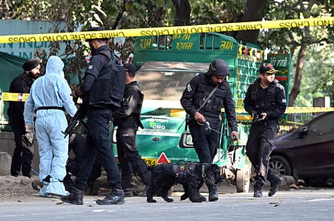 National Security Guard personnel conduct investigation at the site after a blast was reported near a PVR at the Prashant Vihar area, in New Delhi.