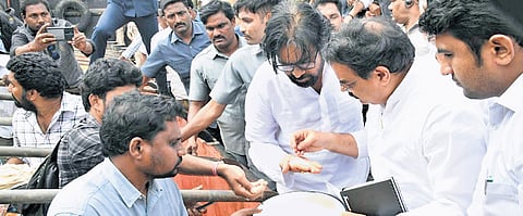 Deputy CM Pawan Kalyan and Civil Supplies Minister Nadendla Manohar at the Kakinada Port.
