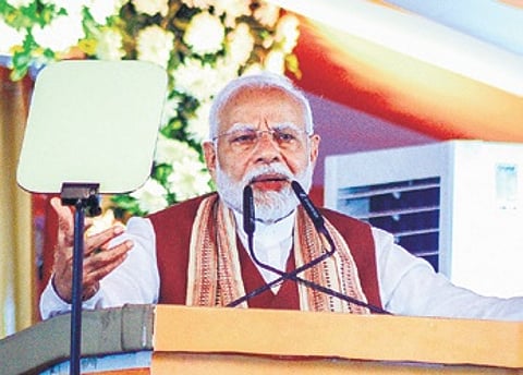 PM Narendra Modi addressing the public meeting in Bhubaneswar on Friday