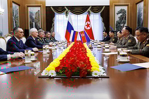 In this photo released by Russian Defense Ministry Press Service, Russian Defense Minister Andrei Belousov, second left, speaks with North Korean Defense Minister No Kwang Chol, second right, during their meeting in Pyongyang, North Korea, Friday, Nov. 29, 2024.