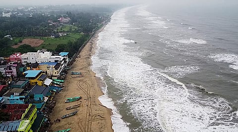 Areial view of high tide and waves lashing at the shores of Mahabalipuram, on Friday ahead of Cyclone Fengal's landfall.