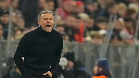 PSG's head coach Luis Enrique gives instructions to his players during the Champions League opening phase soccer match between FC Bayern and Paris Saint Germain.