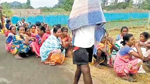 Villagers peforming post-death rituals