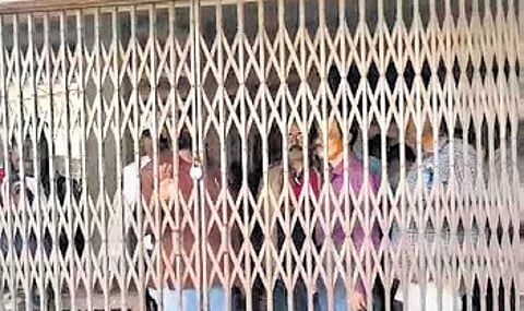 Students lock the institution's main gate in protest.