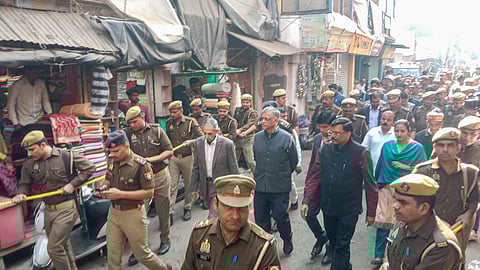 A three-member judicial commission comprising retired Allahabad High Court judge Devendra Kumar Arora, retired IAS officer Amit Mohan Prasad and retired IPS officer Arvind Kumar Jain visits the Shahi Jama Masjid, in Sambhal, Uttar Pradesh, Sunday, Dec. 1, 2024