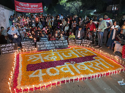 Specially enabled kids of Bhopal Gas Tragedy survivors observing candle light vigil on the eve of 40th anniversary of the 1984 tragedy in Bhopal.