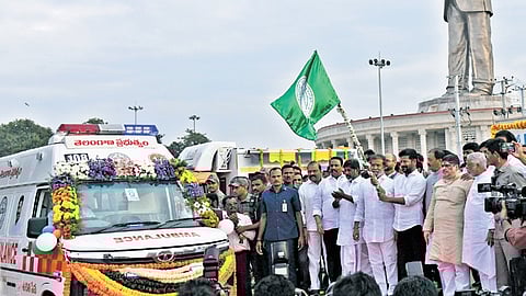 Flanked by his Cabinet colleagues and others, Chief Minister A Revanth Reddy flags off an ambulance during the Aarogya Utsavalu in Hyderabad on Monday