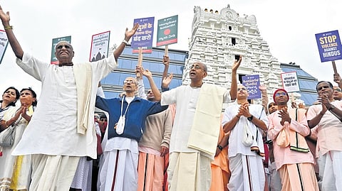 ISKCON Priests and devotees protest against atrocities on Hindus in Bangladesh, in Bengaluru on Sunday