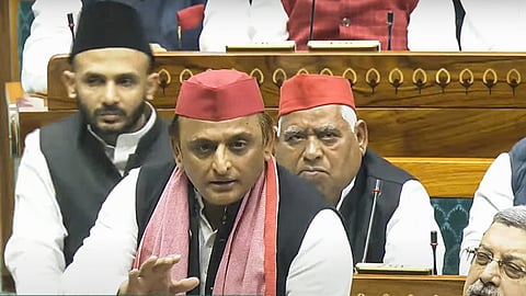 Samajwadi Party MP Akhilesh Yadav speaks in the Lok Sabha during the Winter session of Parliament, in New Delhi.