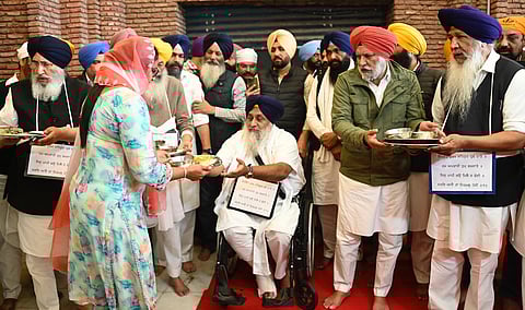 SAD leaders performing the duty of 'sewadar' at the Golden Temple on Tuesday.