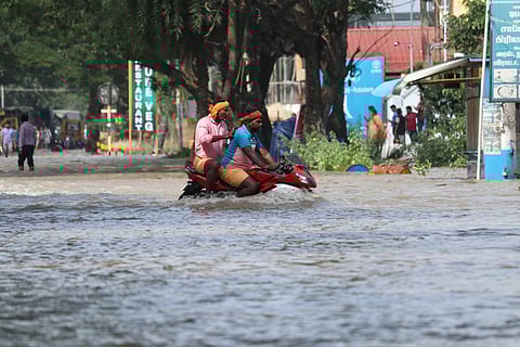 Floodwaters from the Thenpennai River surrounded the pondy-cuddalore road at Kirumambakam in Puducherry.