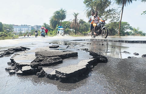 The damaged ECR Road from Puducherry to Cuddalore