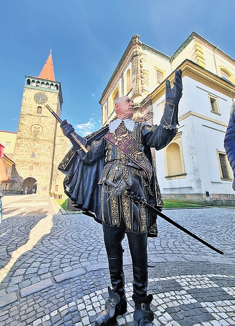 A local guide dressed as a Medieval Duke