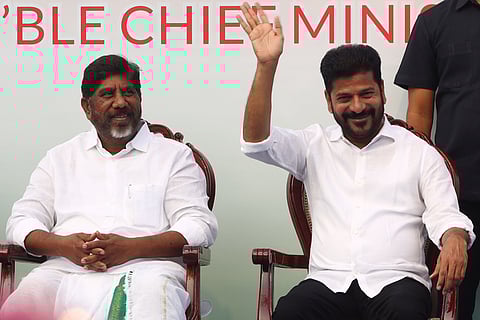 Chief Minister A Revanth Reddy waves