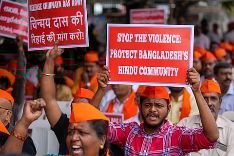 Members of Hindu Aikya Vedika or Hindu United Front shout slogans condemning the recent arrest of prominent Hindu leader Krishna Das Prabhu and the alleged attacks on Hindus in Bangladesh during a protest in Hyderabad