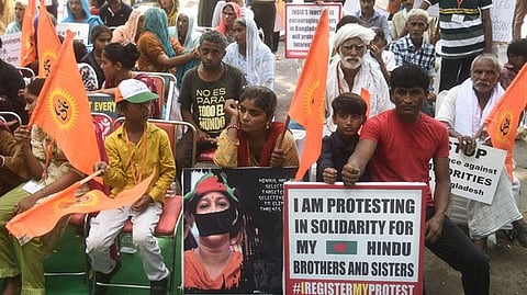 Members of Hindu organisations protest over the violence against minorities in Bangladesh, at Jantar Mantar in New Delhi.