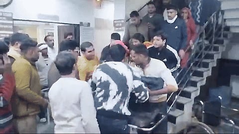 The deceased woman, identified as Karishma, was being moved to a ward on the ground floor following her delivery.