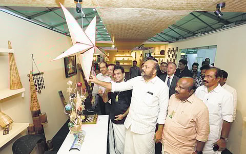 Industries Minister P Rajeeve visiting the stalls after inaugurating the Kerala Bamboo Fest at Marine Drive in Kochi on Saturday.