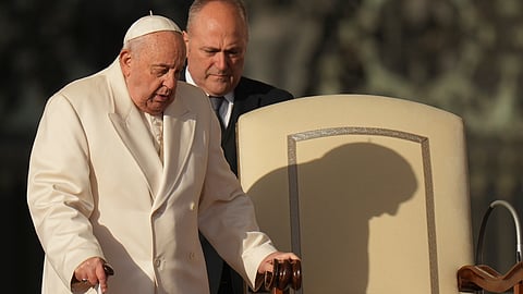 Pope Francis arrives for his weekly general audience in St. Peter's Square at The Vatican, Wednesday, Dec. 4, 2024.
