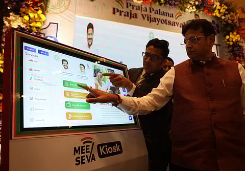 IT & Industries Minister D Sridhar Babu inaugurates the MeeSeva kiosk during the Praja Palana Vijayotsavalu programme