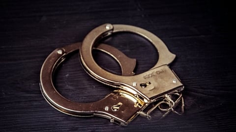 Man held over hoax bomb threat