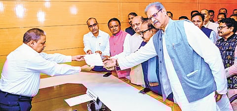 Sujeet Kumar flanked by CM Mohan Majhi, state BJP chief Manmohan Samal and deputy CM KV Singh Deo filing his nomination papers for Rajya Sabha election