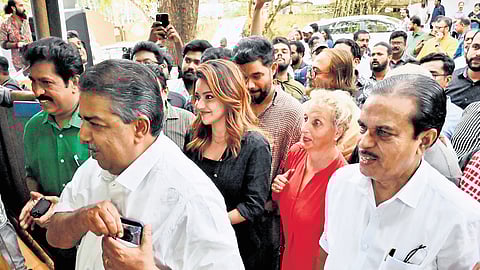 Cultural Affairs Minister Saji Cherian arriving for the inauguration of the delegate cell and pass distribution for the 29th International Film Festival of Kerala at Tagore Theatre in Thiruvananthapuram on Tuesday